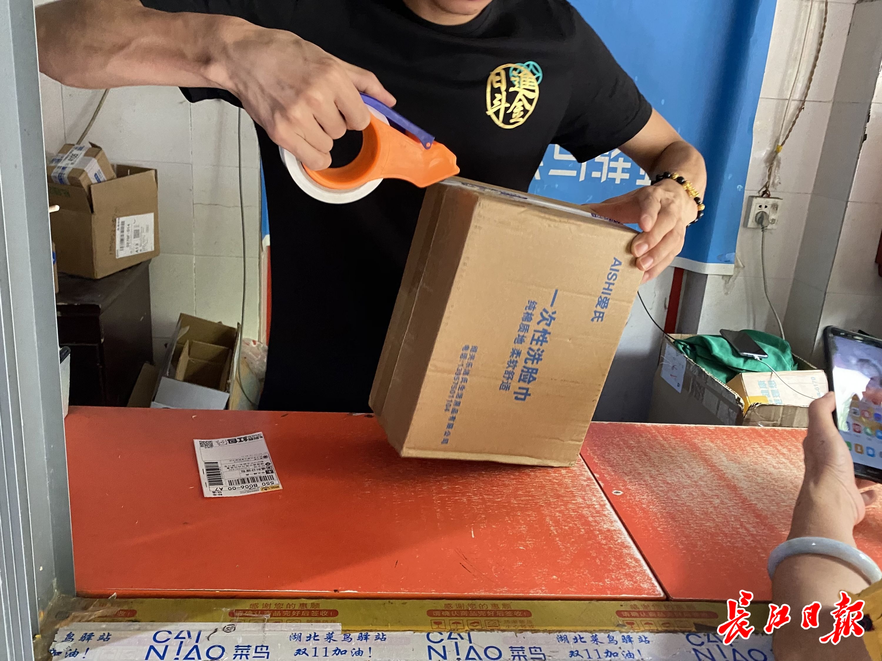 快递包装如何绿色瘦身武汉快递点这样做